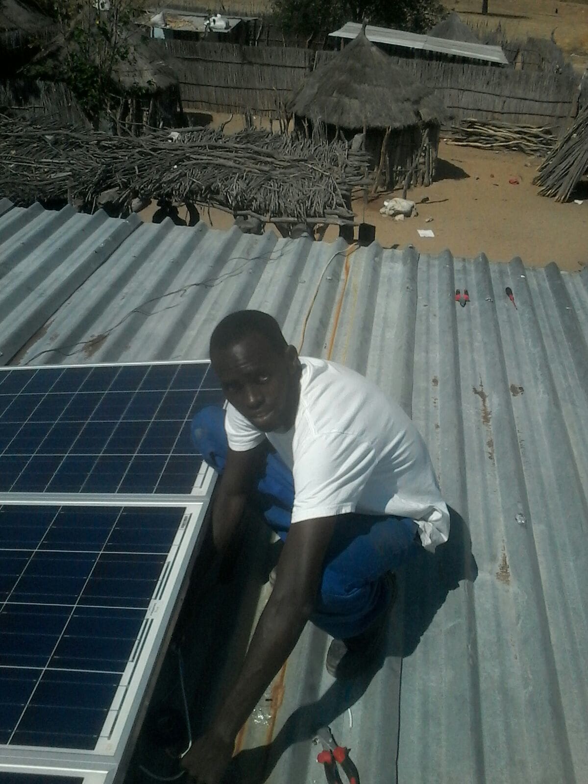 Jonathan installing solar panels
