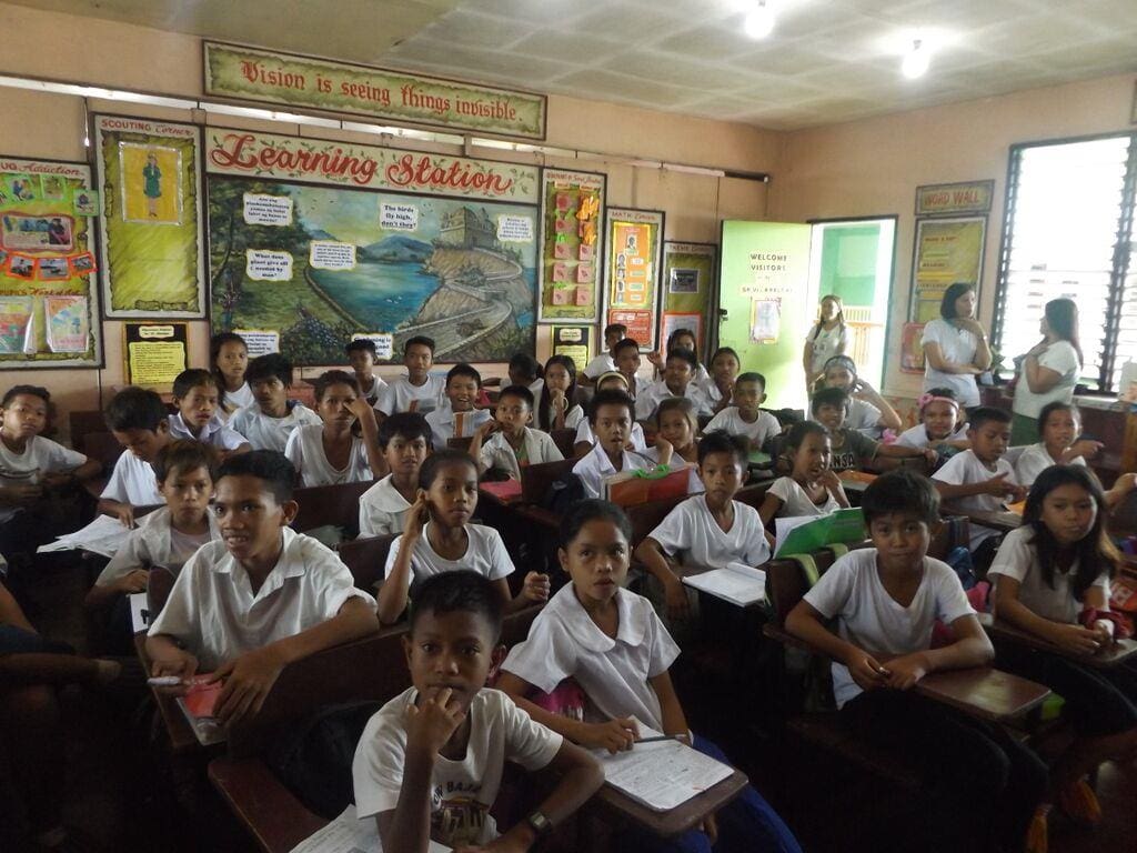 Badjao boys and girls in elementary class