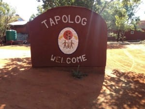 Tapologo (missing the o!) sign at entrance to the Hospice and administrative buildings in Phokeng