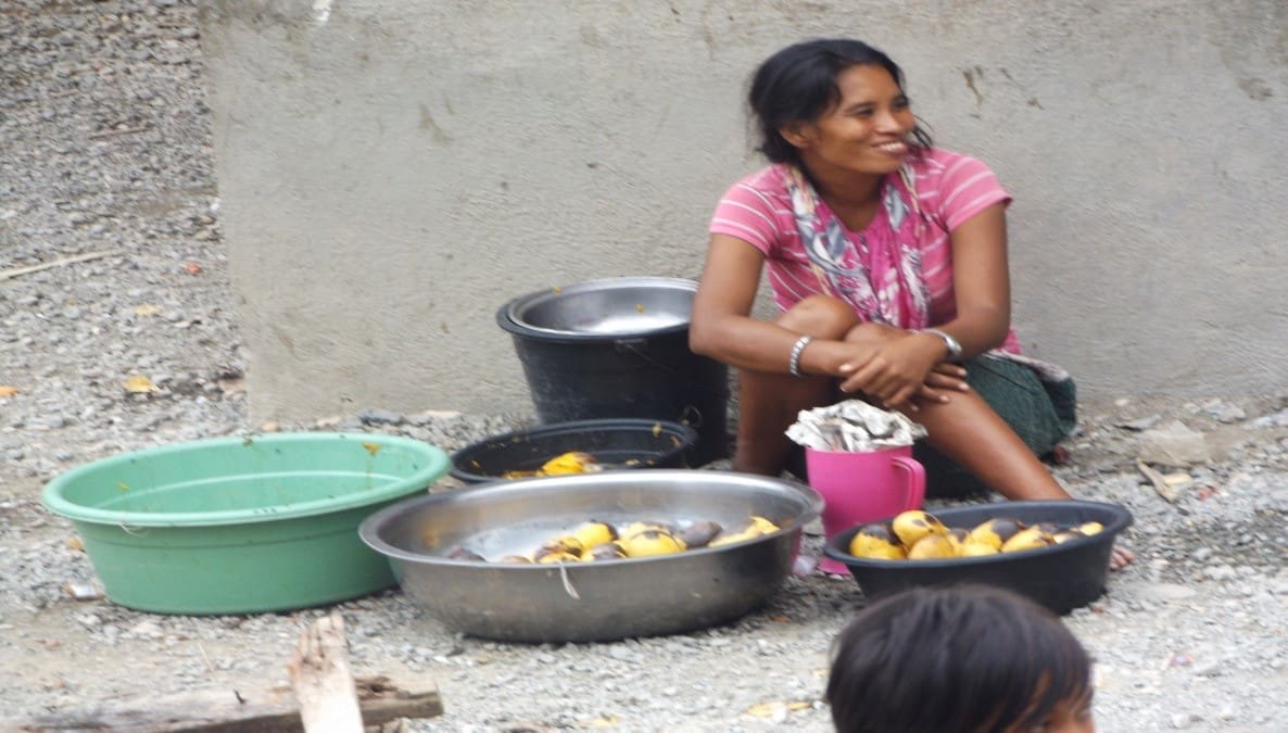 A Badjao women selling Mangoes; the most common fruit of the Philippines