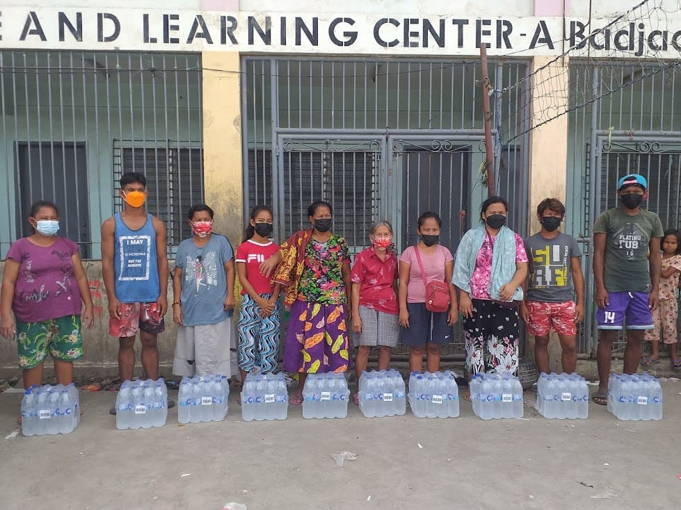 Badjao community receiving water Dec 28th