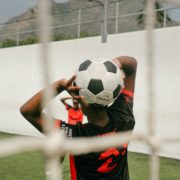 Photo by RF._.studio: https://www.pexels.com/photo/a-player-holding-a-soccer-ball-3886252/