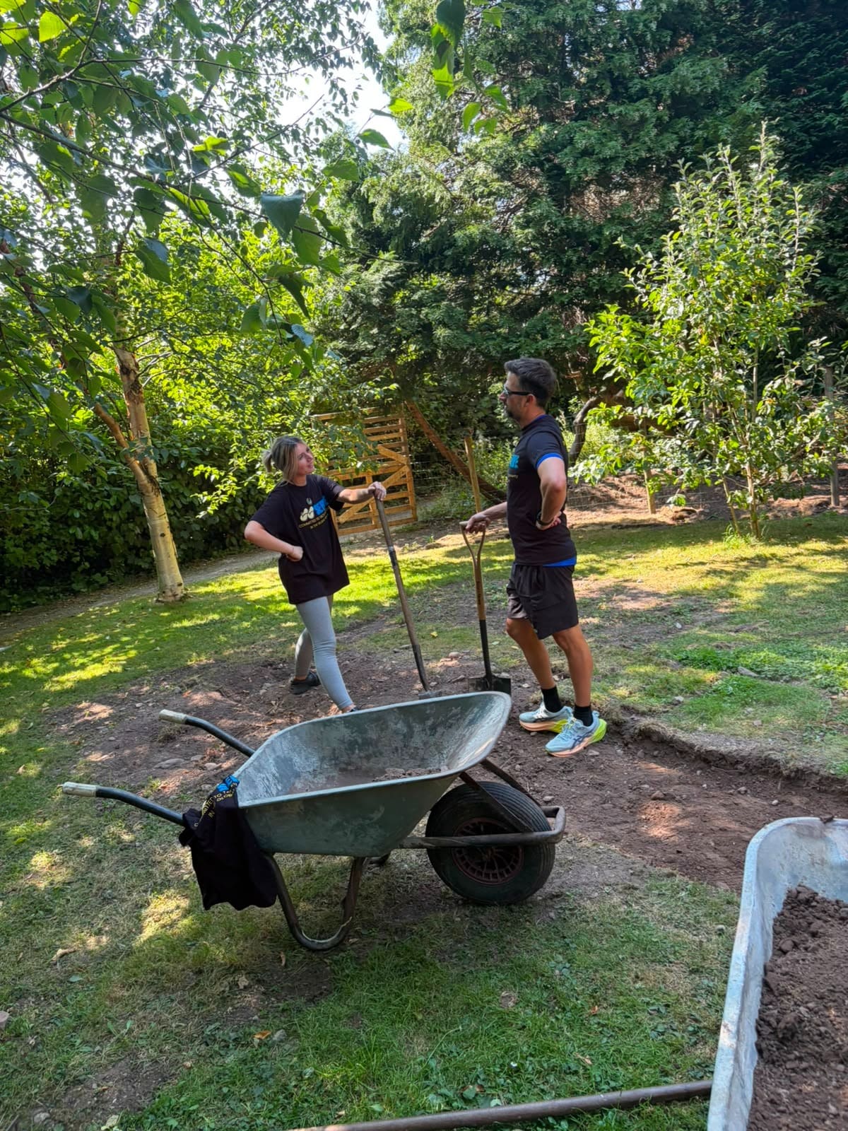 Volunteers with tools in the Scala Sensory Garden